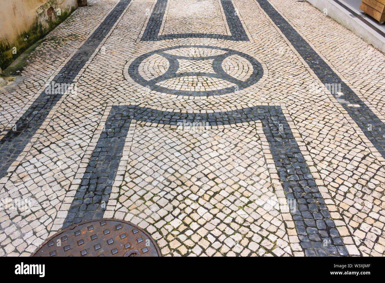 Strada con la massa di pietra, Macao Foto Stock