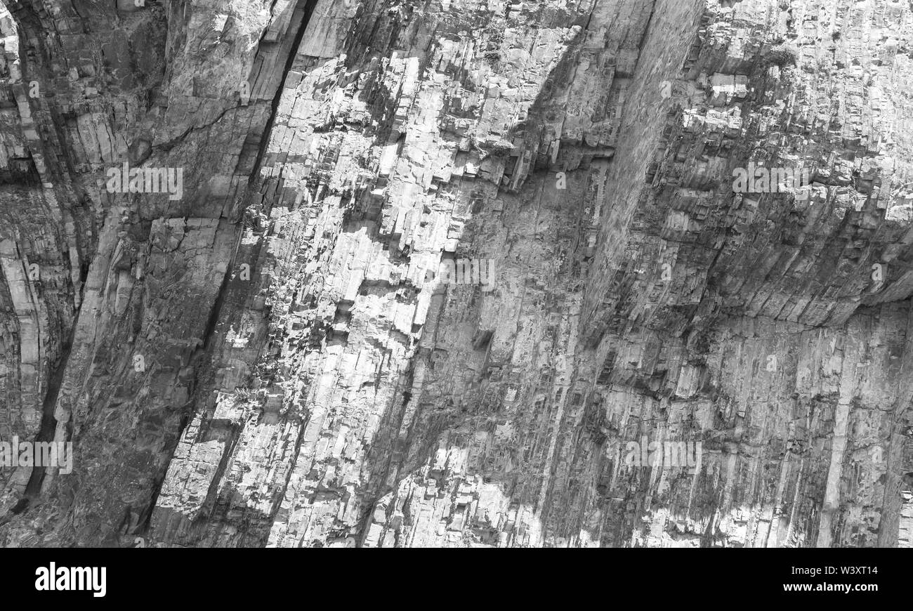 Naturale ruvida parete di roccia, foto di sfondo texture Foto Stock