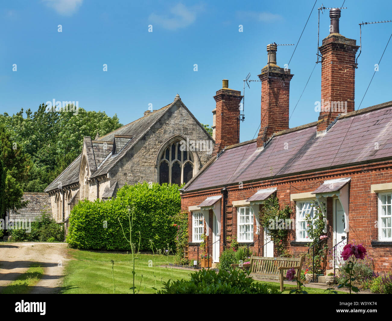 Gli ospizi di carità e la cappella e ora convertiti a uso residenziale sulla strada Magdelens in Ripon North Yorkshire, Inghilterra Foto Stock