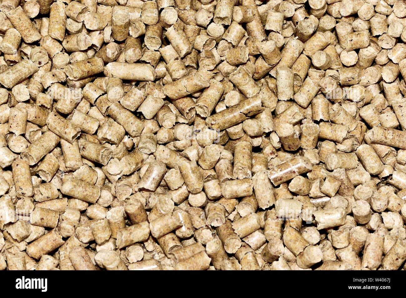 Pellet di legno dello sfondo. La lettiera del gatto. I biocarburanti. Foto Stock