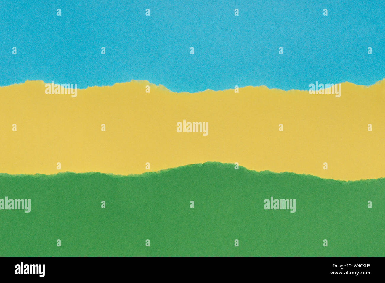 Colorato i pezzi di carta strappata texture di sfondo: verde, giallo, blu Foto Stock