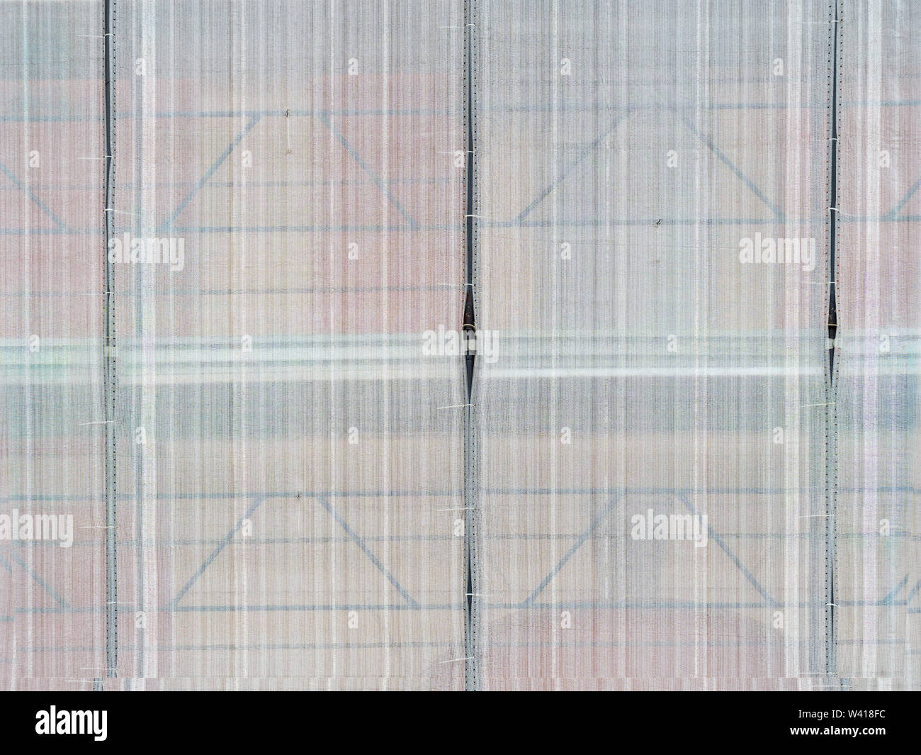 Ponteggio copre, reti, sito di costruzione dello sfondo. In costruzione. Foto Stock