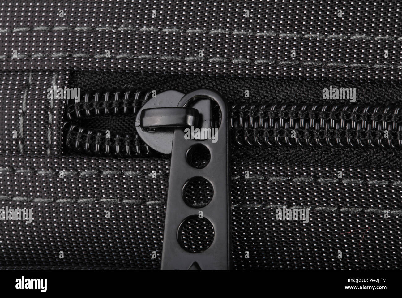 Borsa nera con puntini bianchi Foto Stock