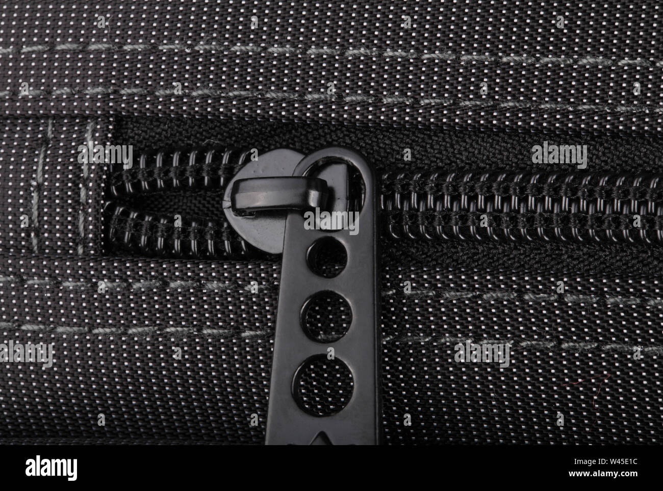 Borsa nera con puntini bianchi Foto Stock