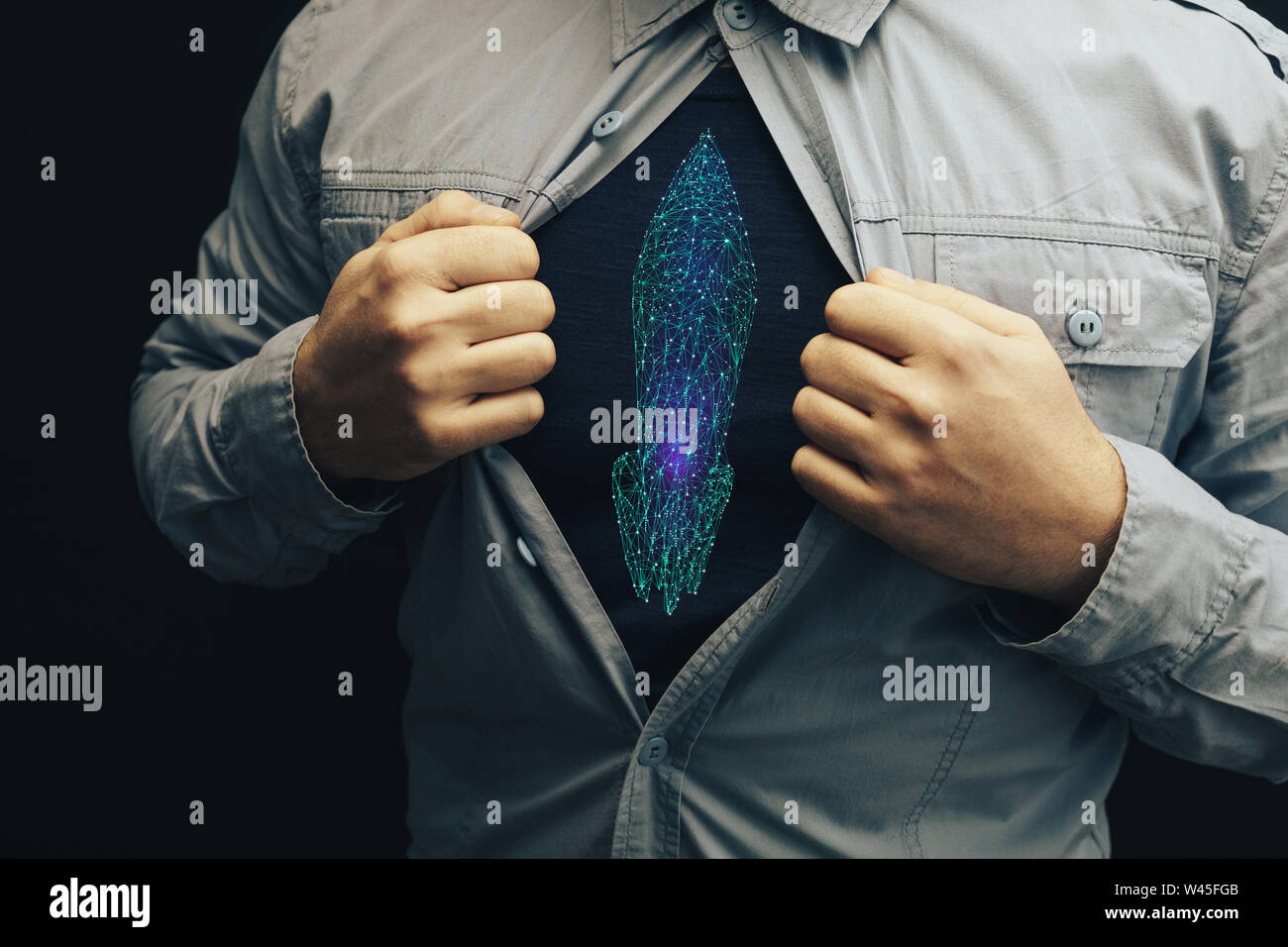Business man in maglia con una foto razzo. Foto Stock