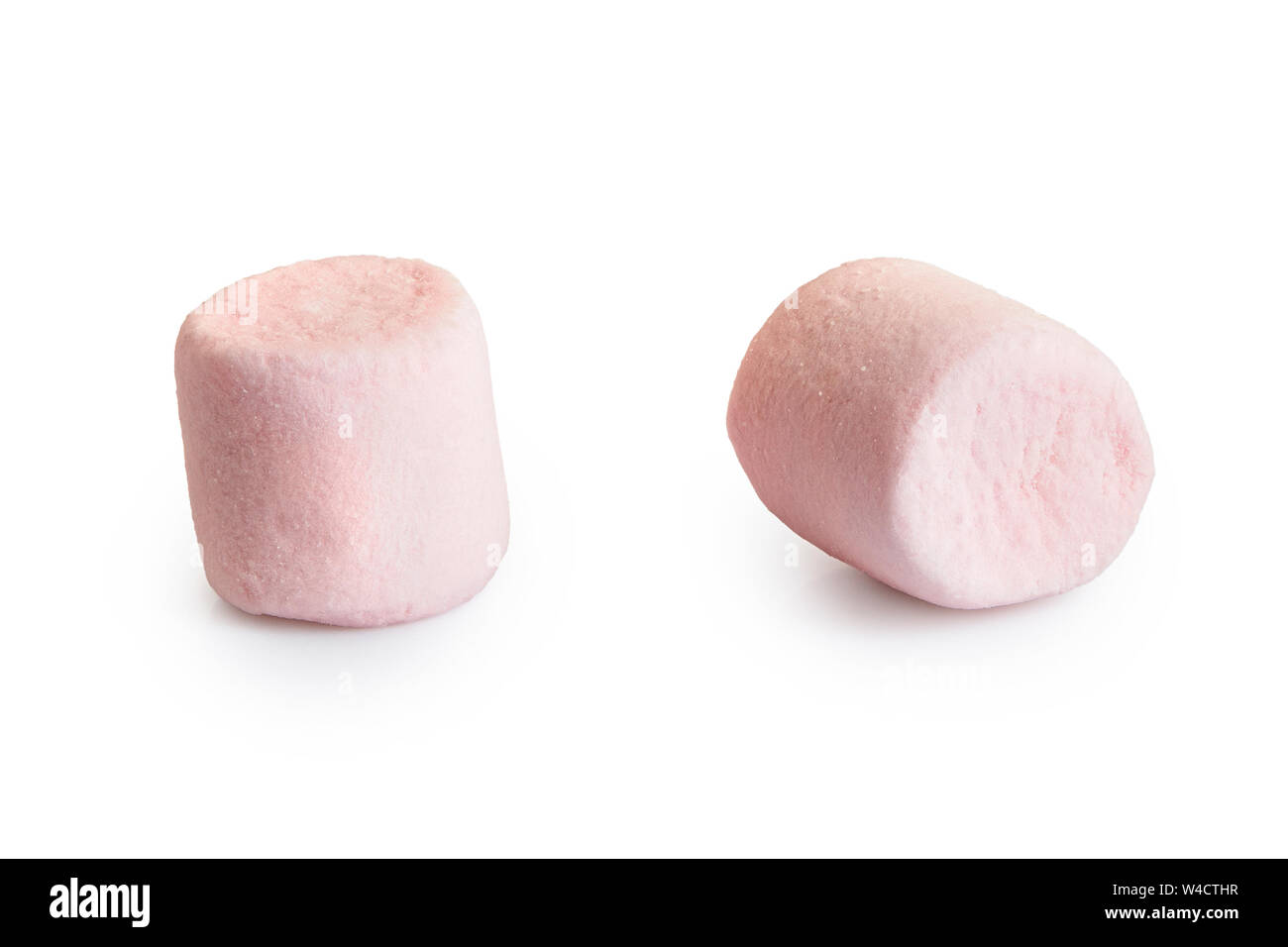 Due mini rosa marshmallows isolato su bianco. Foto Stock