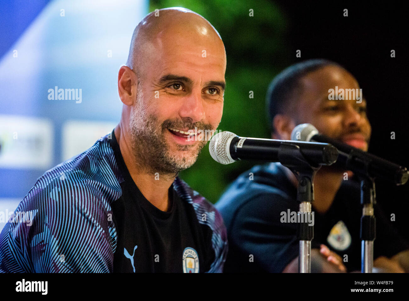 Hong Kong, Cina. 23 Luglio, 2019. Premier League club Manchester CityÕs star player Raheem Sterling e Manager Pep Guardiola (nella foto) si incontrano i media cinesi presso il Grand Hyatt di Wan Chai Credito: Hong Kong Photo News Alamy Live News Foto Stock