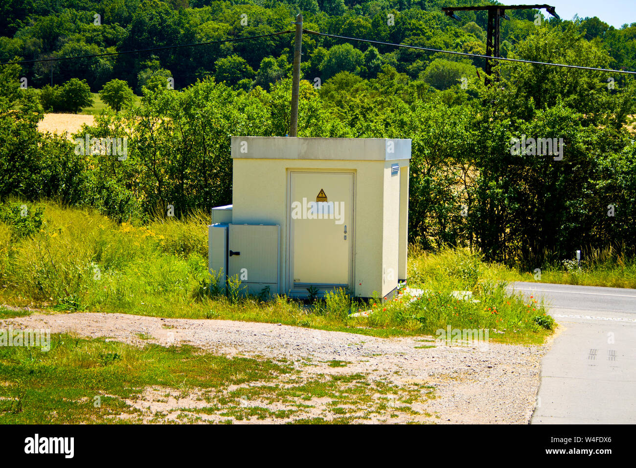 Trasformatore casa del fornitore di elettricità Foto Stock