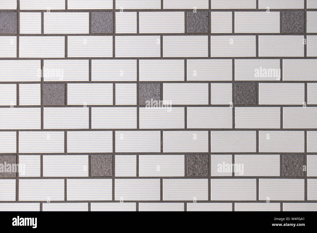 Muro di mattoni grigio Foto Stock