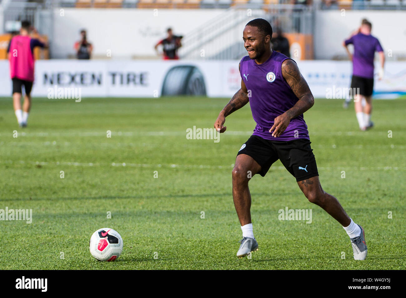Hong Kong, Hong Kong, Cina. 23 Luglio, 2019. Premier League inglese team, Manchester City football club andare attraverso i loro passi in formazione nella calda Hong Kong meteo. Incontrate il team locale Kitchee FC per un pre-stagione partita di domani. Raheem Sterling Credit: HKPhotoNews/ Alamy Live News Foto Stock