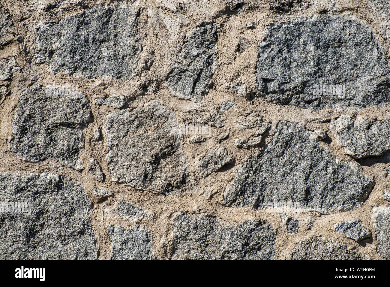 Risorse grafiche di granito grigio e il muro di cemento vicino fino Foto Stock