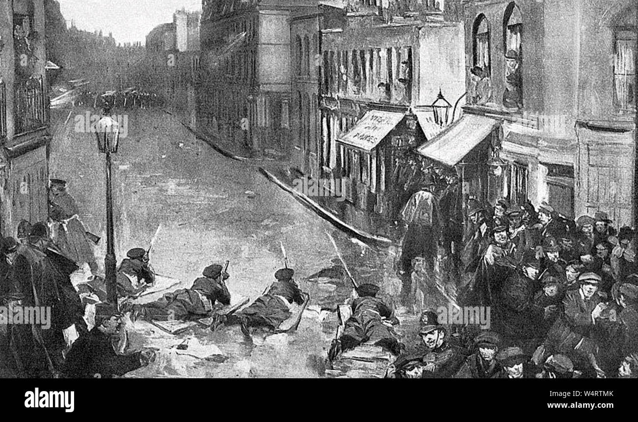 Assedio di Sidney Street Gennaio 1911. Soldati prona stabiliscono il fuoco sul lettone rivoluzionari a 100 Sydney Street, East London. Foto Stock