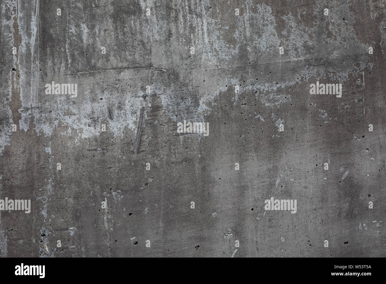 Testurizzato grigio muro di cemento esterno Foto Stock
