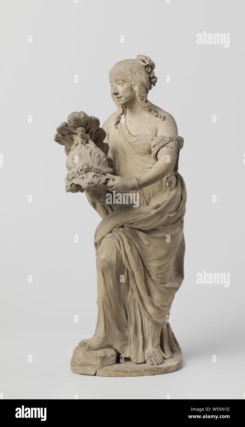 Joan Huydecoper e Sophia Coymans come Marte e Venere Sophia Coymans (1636-1714) come Venere, essa si erge a tre quarti a sinistra sulla gamba sinistra e poggia il piede della gamba destra su un blocco di pietra. Con entrambe le mani ha le mani di lui un riccamente decorato casco, che mostra una maschera leewe sulla parte anteriore, è coronato con foglie di alloro e ha un casco segno, costituito da un sitren al di sopra della quale gli struzzi. Ella è vestito in un sottile manto con maniche corte che è scivolato dalla spalla sinistra. Il manto viene eseguito dal braccio destro lungo la schiena e anca sinistra ed è ripiegata sulla sollevata la coscia destra. I capelli Foto Stock