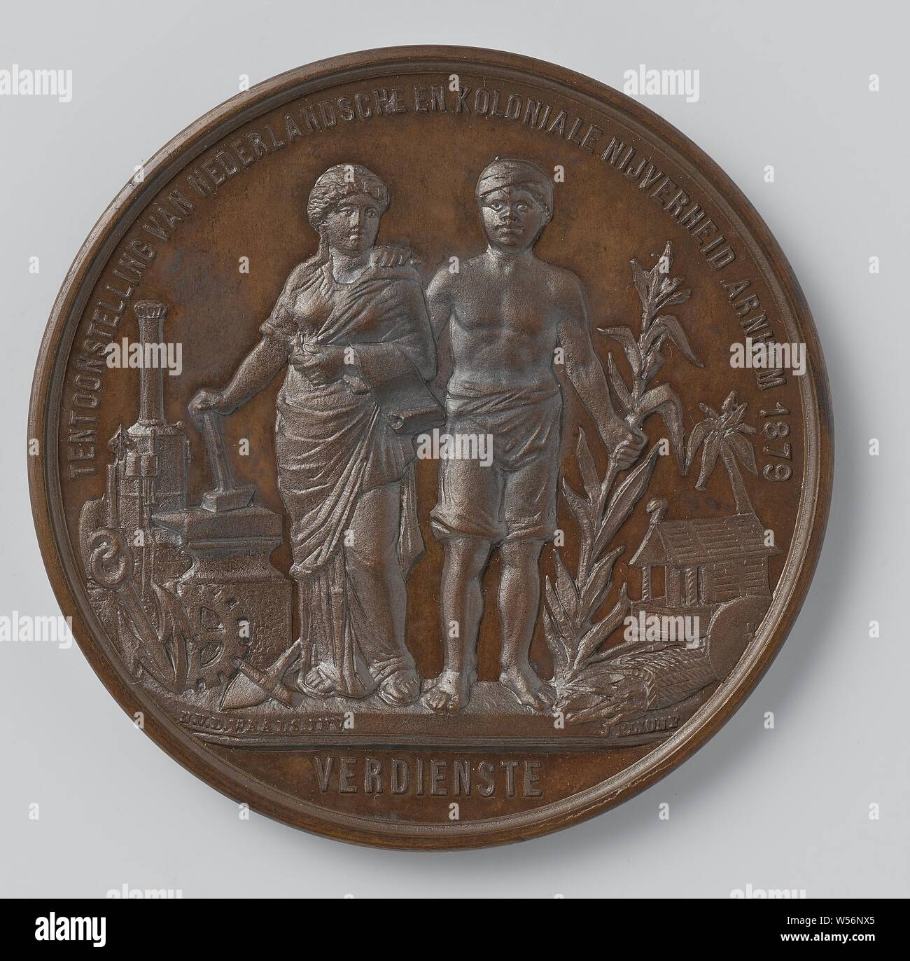 Mostra di olandese e industria coloniale di Arnhem, 1879, medaglia di bronzo in un round in una scatola di legno con velluto viola e un twist-off coperchio. Complementare: Paesi Bassi come una donna affiancato da un uomo indiano con una circoscrizione. Retromarcia: corona di alloro. Arnhem, Noach van der Waals, Paesi Bassi, penning, doosje, d 5 cm × w 48.98 gr d 6 Foto Stock