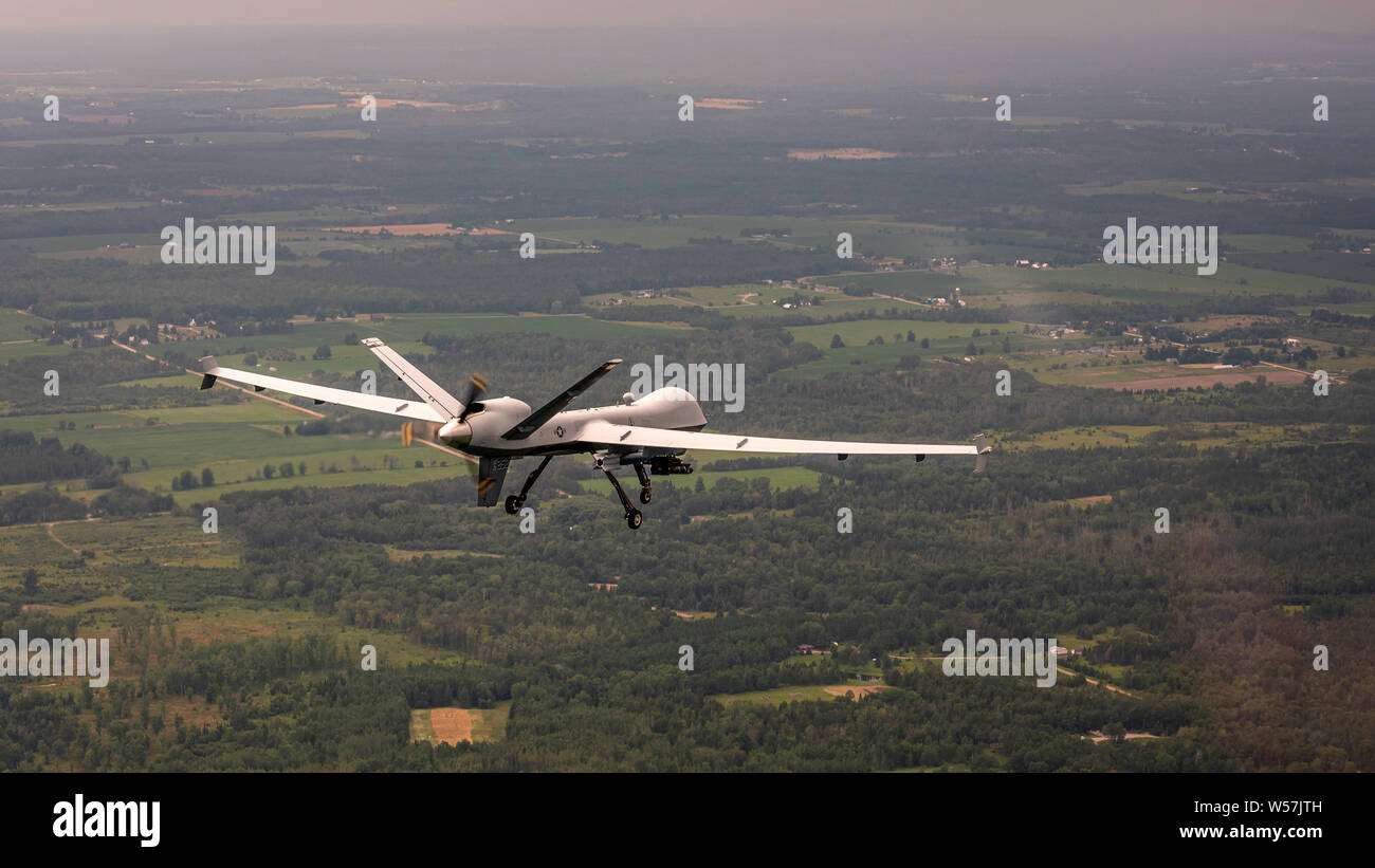Un U.S. Air Force MQ-9 Reaper drone inflight durante un allenamento sortie in esercizio sciopero settentrionale 19 al Alpena Combat Readiness Training Center Luglio 24, 2019 in Alpena, Michigan. Foto Stock