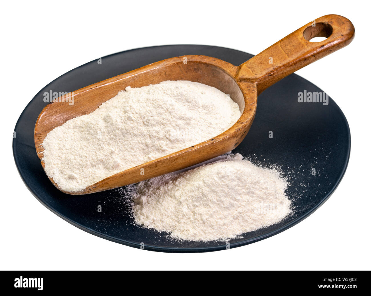 Manioca (yuca) di farina con un cucchiaio di legno e la piastra. È un senza  glutine di grano e sostituzione gratuita per la farina di frumento Foto  stock - Alamy