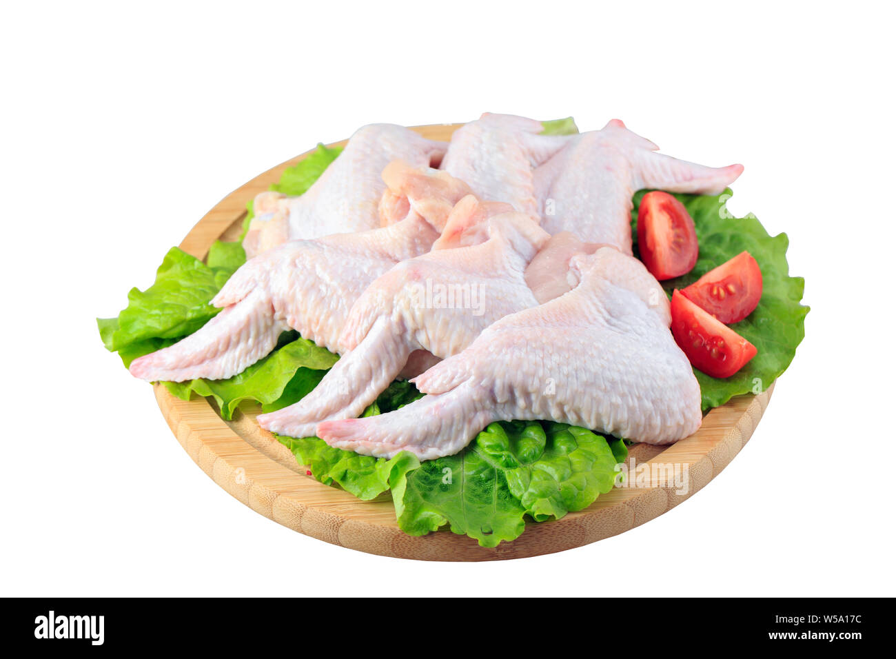 Il pollo crudo ali su sfondo bianco Foto Stock