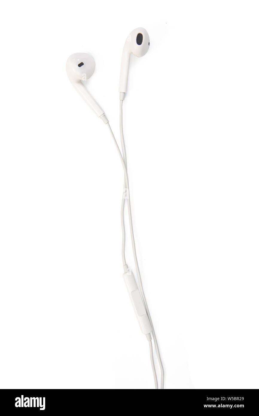 Gli auricolari bianco isolato su sfondo bianco con tracciato di ritaglio Foto Stock