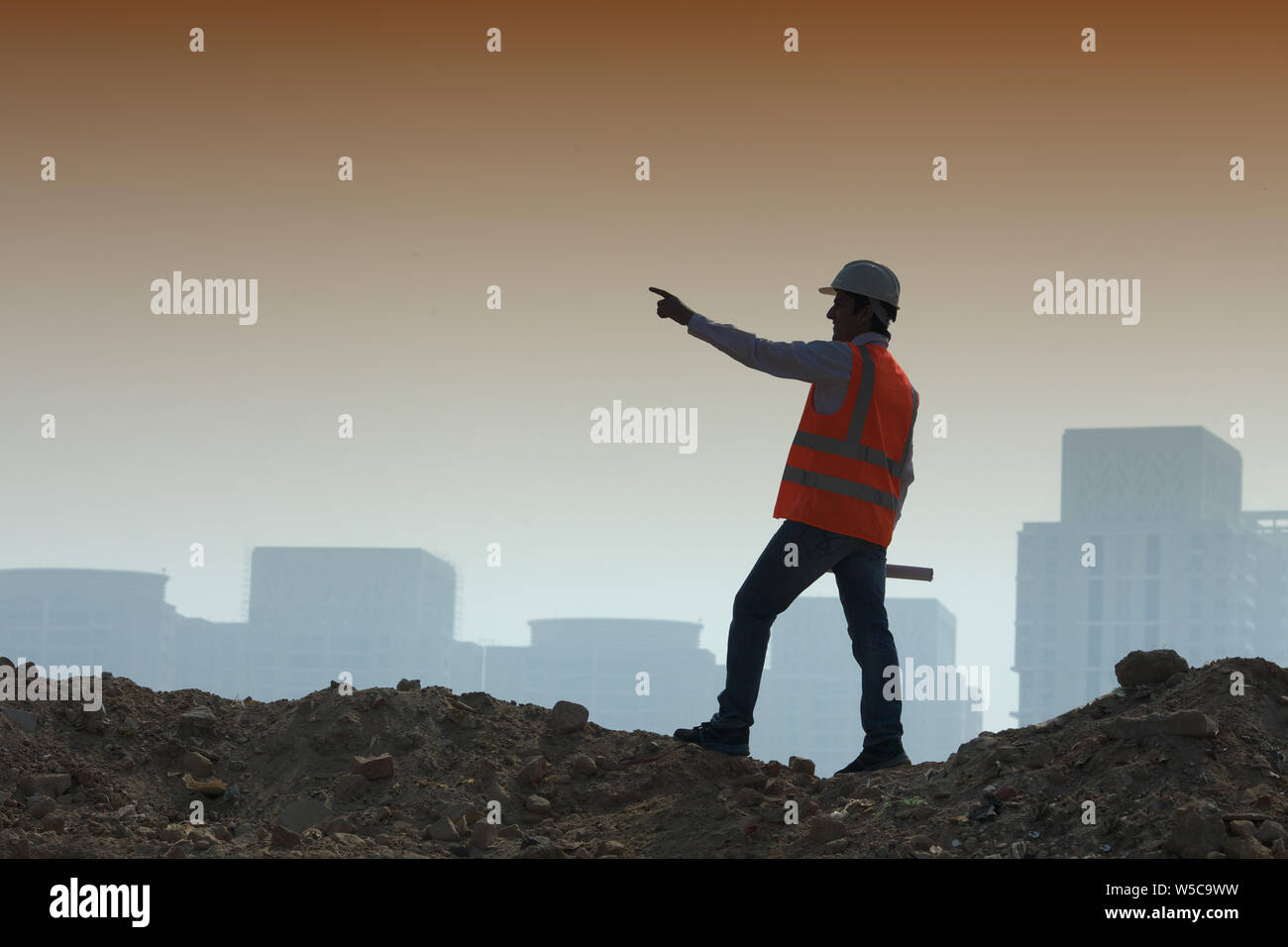 Architetto che punta al cantiere Foto Stock