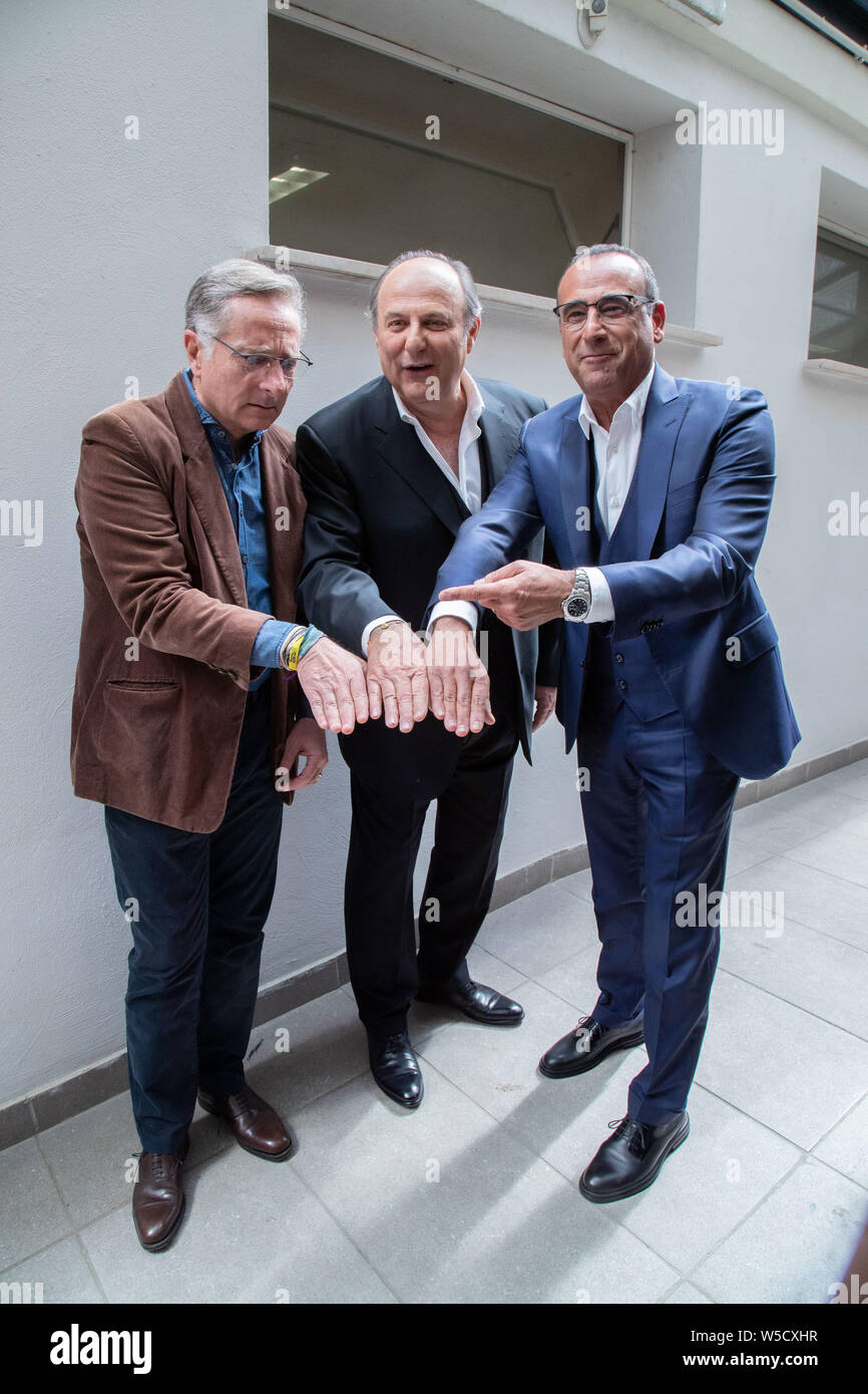 Paolo Bonolis Carlo Conti e Jerry Scotti assiste al Maurizio Costanzo Show Foto Stock