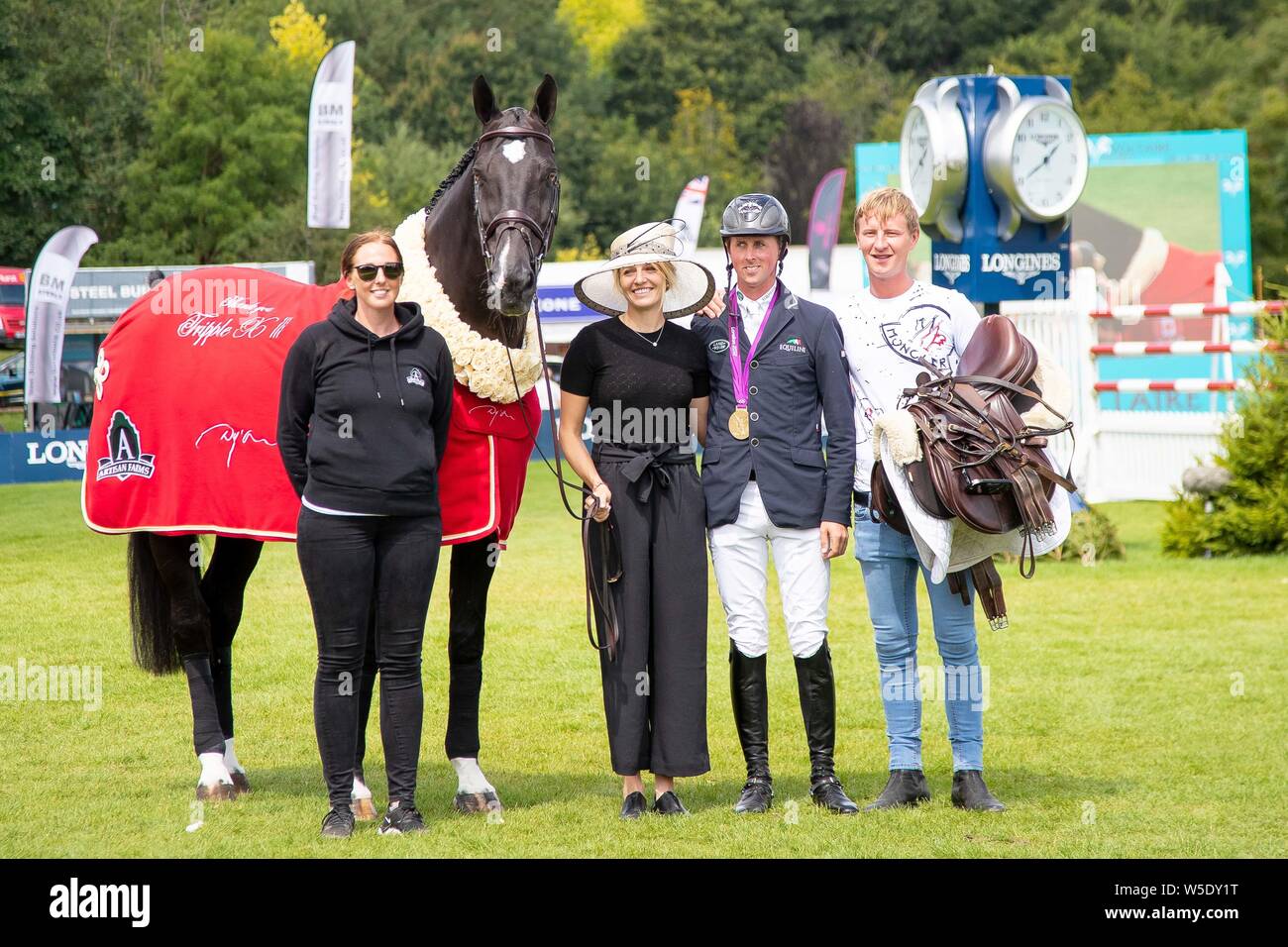 Hickstead, West Sussex, Regno Unito. Il 28 luglio 2019. Il pensionamento di Triple X. Ben Maher (GBR). Tiffany Foster (CAN). La BHS Longines King George V Gold Cup presso il Royal International Horse Show. Credito: Sport In immagini/Alamy Live News Foto Stock