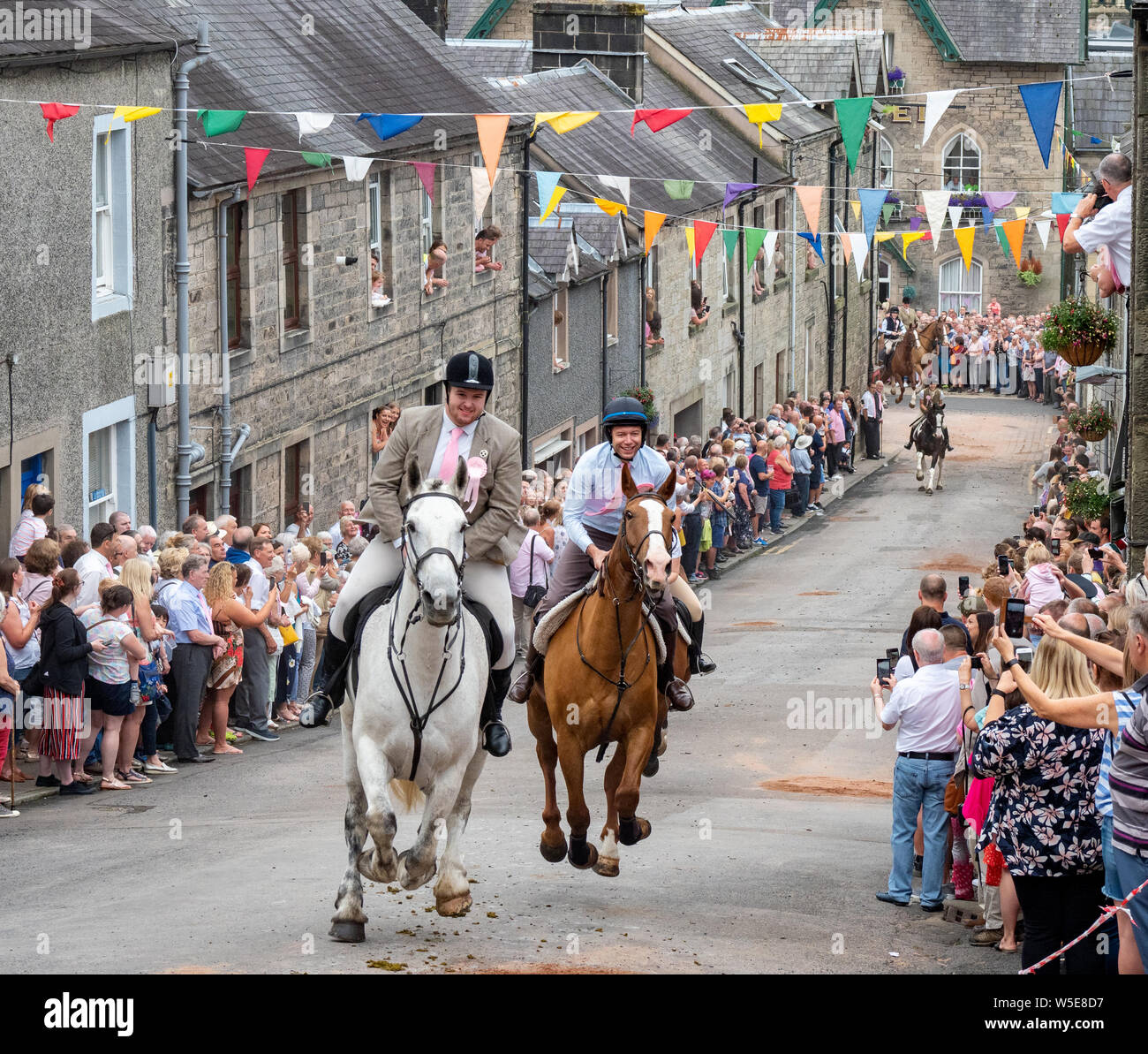 Langholm, Dumfries and Galloway, Scotland, Regno Unito. Il 26 luglio 2019. Il Comune Langholm equitazione, evento annuale che si tiene l'ultimo venerdì di luglio. Foto Stock