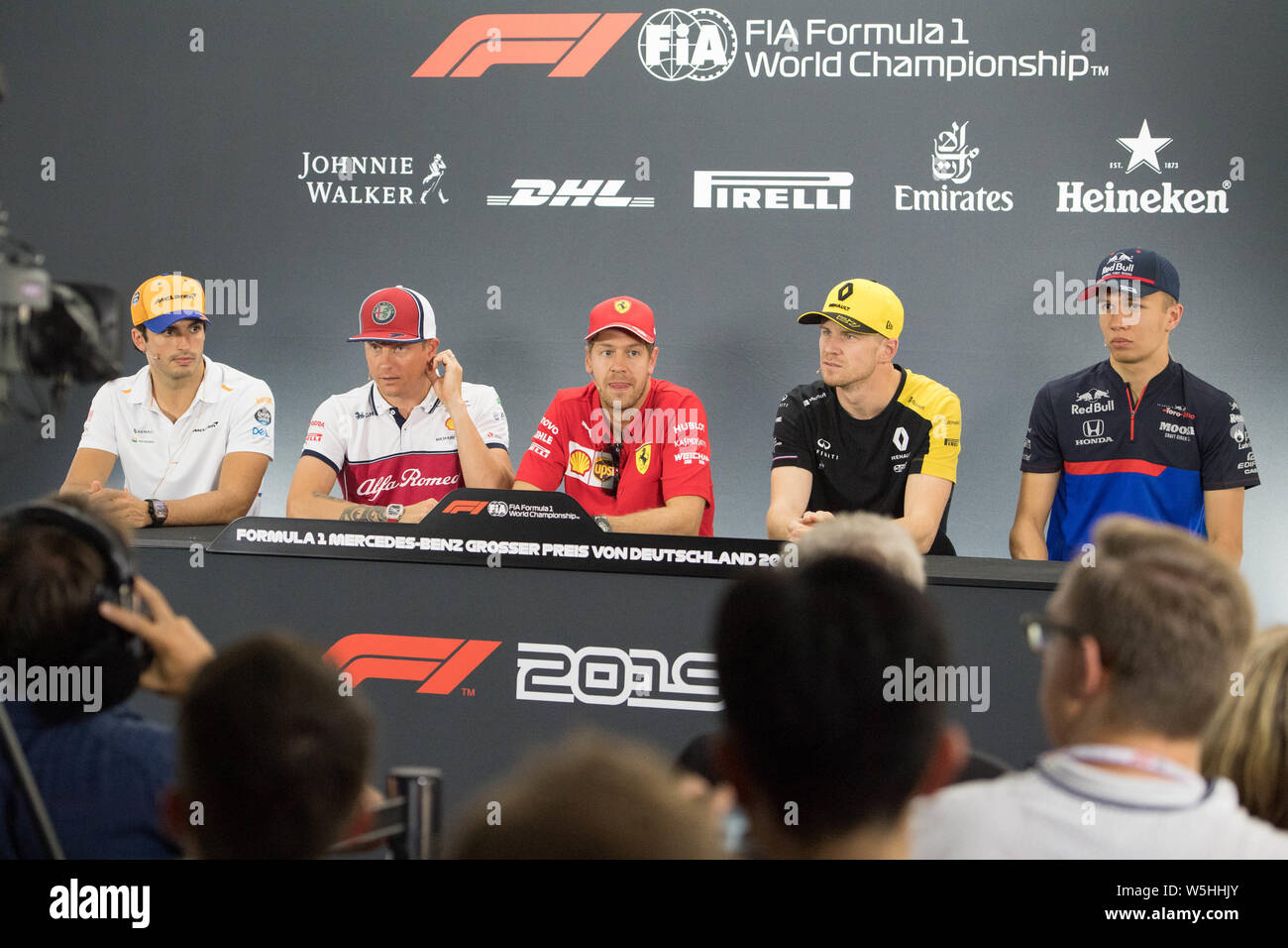 Hockenheim, Deutschland. Xxv Luglio, 2019. Da sinistra a destra: Carlos Sainz (ESP, la McLaren F1 Team), Kimi RAEIKKOENEN (PINNA RÃ ikkÃ'nen, Alfa Romeo Racing), Sebastian Vettel (GER, la Scuderia Ferrari missione vagli), Nico HUELKENBERG (HÃ lkenberg, GER, il Team Renault F1), Alexander Albon (THA, Red Bull goalo Rosso Honda), mezza figura, mezza figura, paesaggio conferenza stampa su 25.07.2019, Formula 1 Gran Premio di Germania a Hockenheim/Germania Da 26.07. - 28.07.2019, stagione2019, | Utilizzo di credito in tutto il mondo: dpa/Alamy Live News Foto Stock