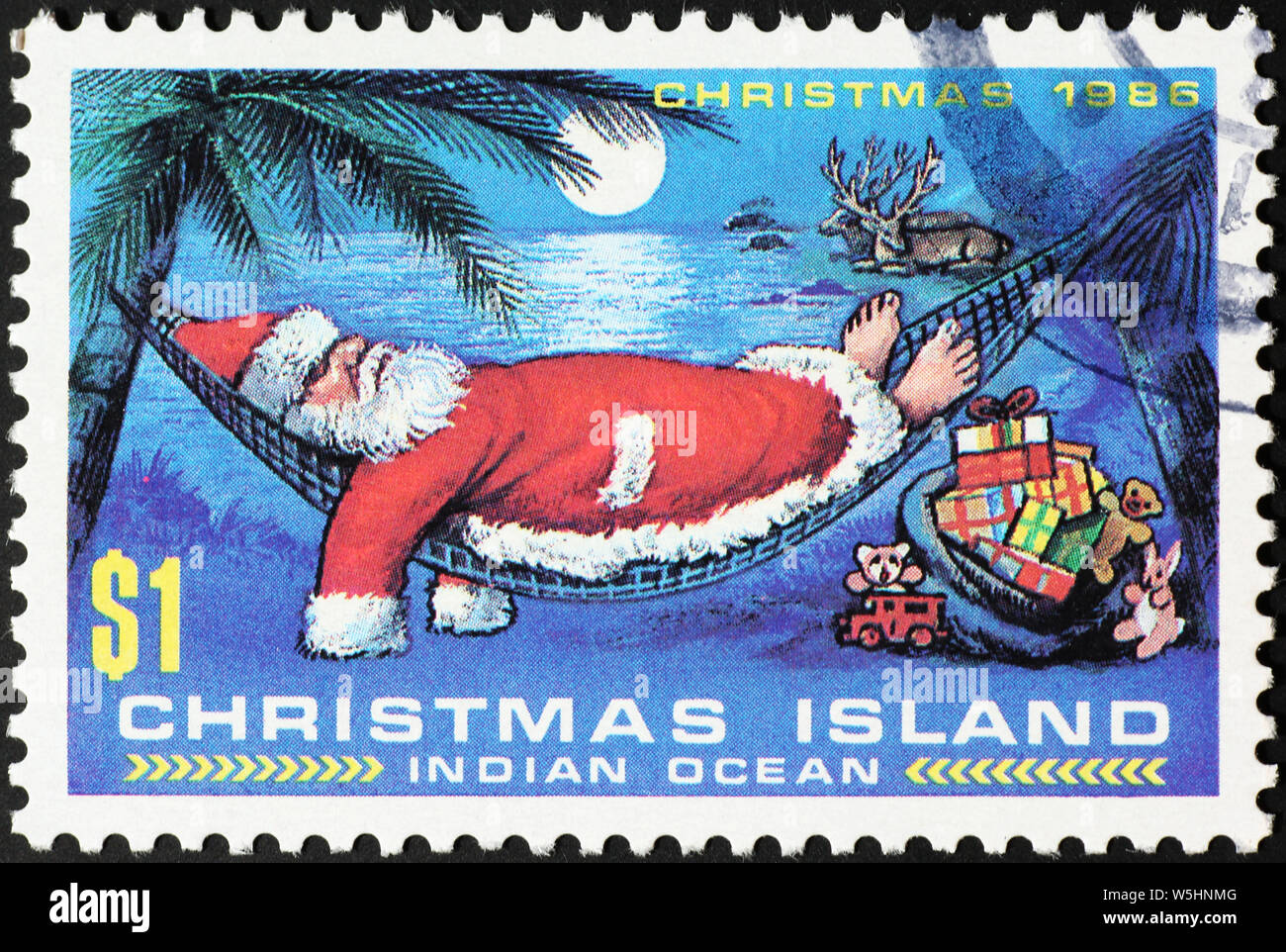 Santa Claus in appoggio sulla isola di Natale francobollo Foto Stock