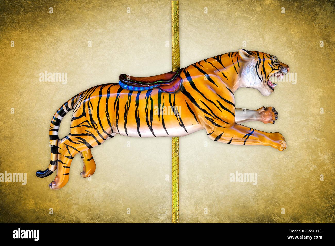 Giostra di carnevale tiger isolato su sfondo blu Foto Stock