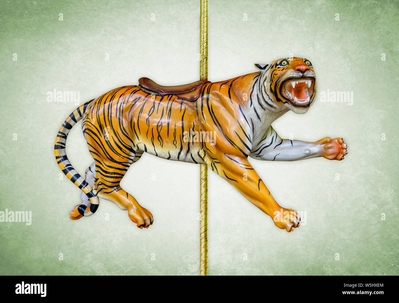 Giostra di carnevale tiger isolato su sfondo verde Foto Stock