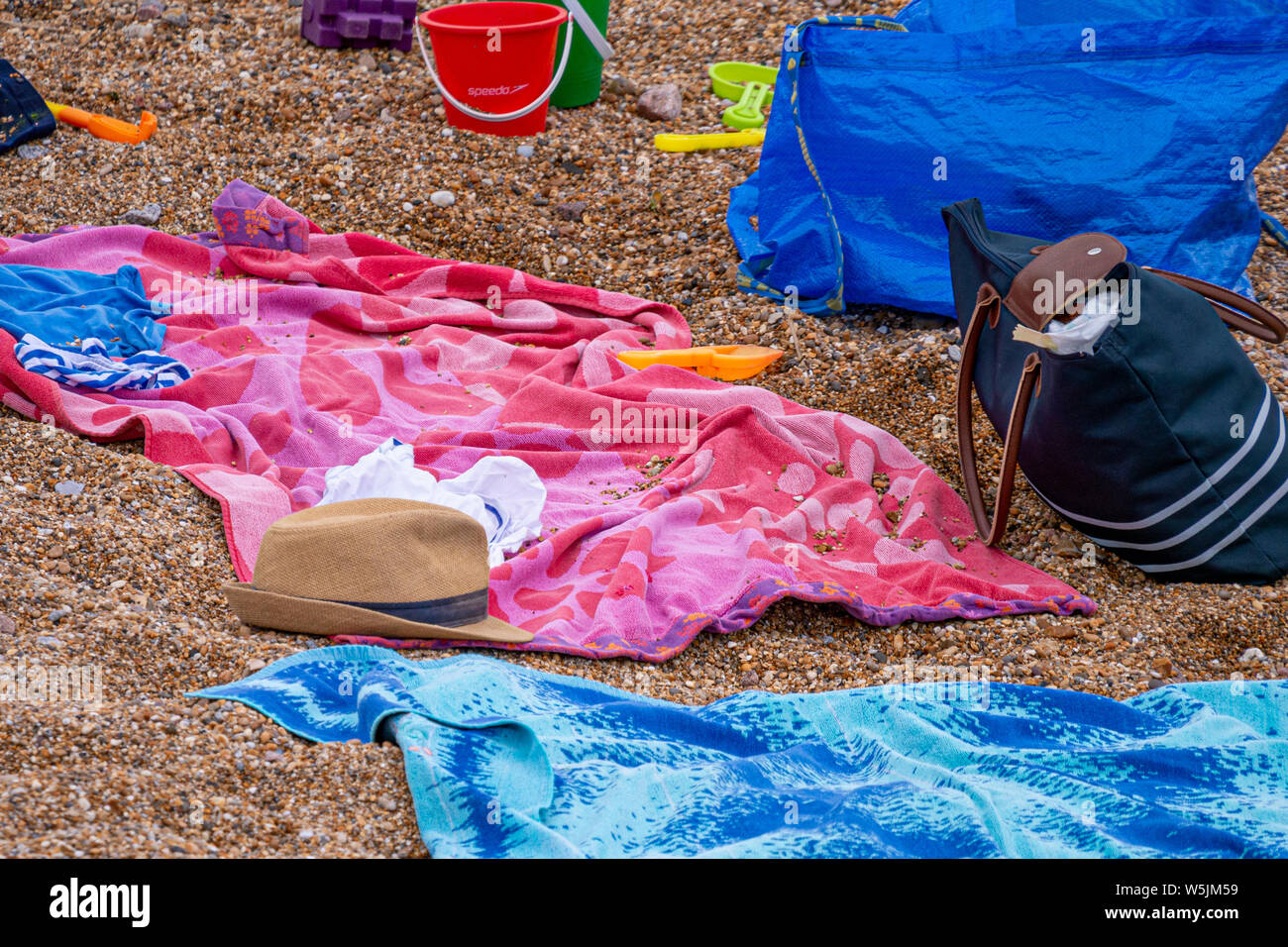 Spiaggia familiare visitare paraphernalia. Foto Stock