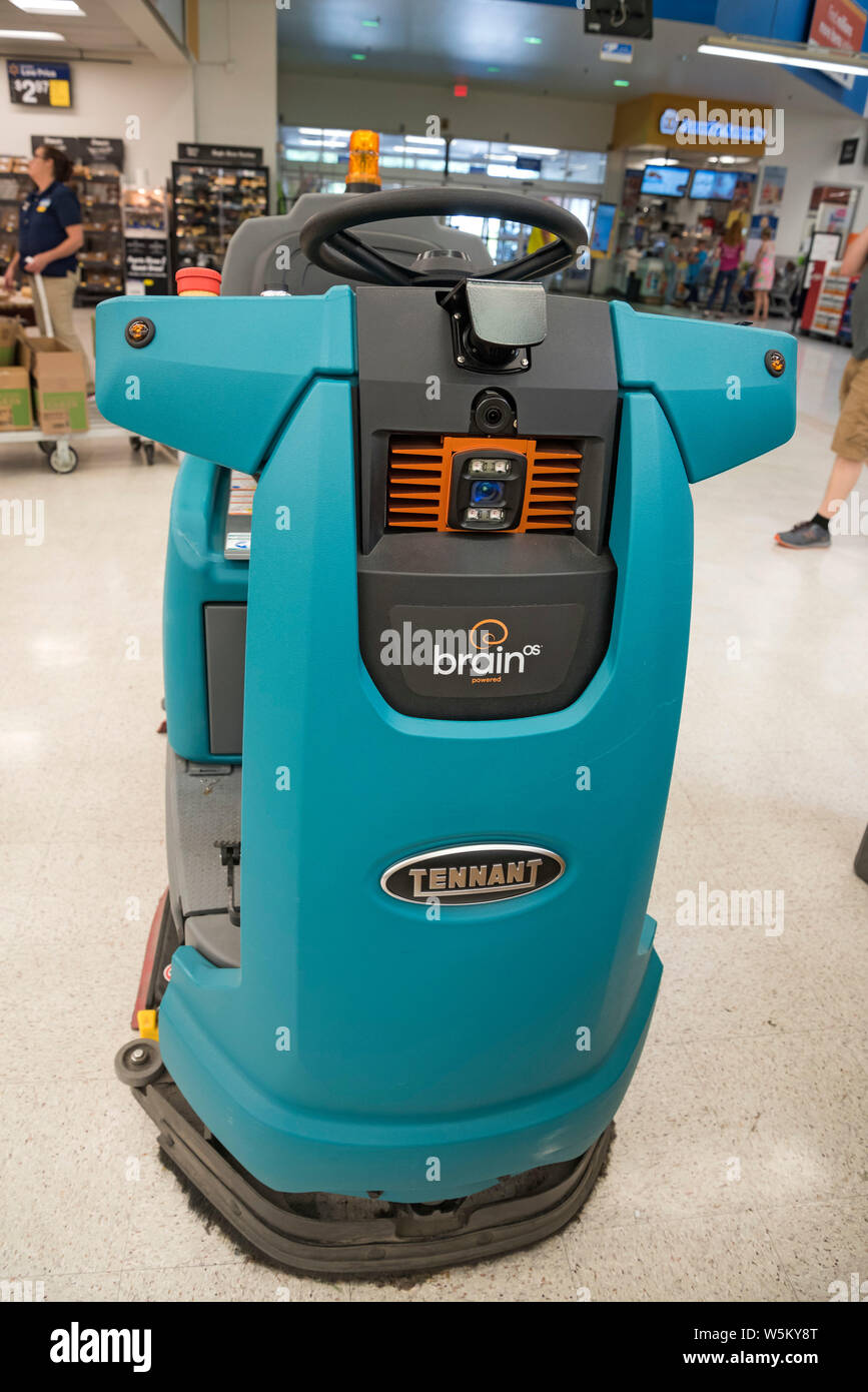 "Wally" la robotica detergente per pavimenti roam intorno al lago di città, Florida, Walmart.. Foto Stock