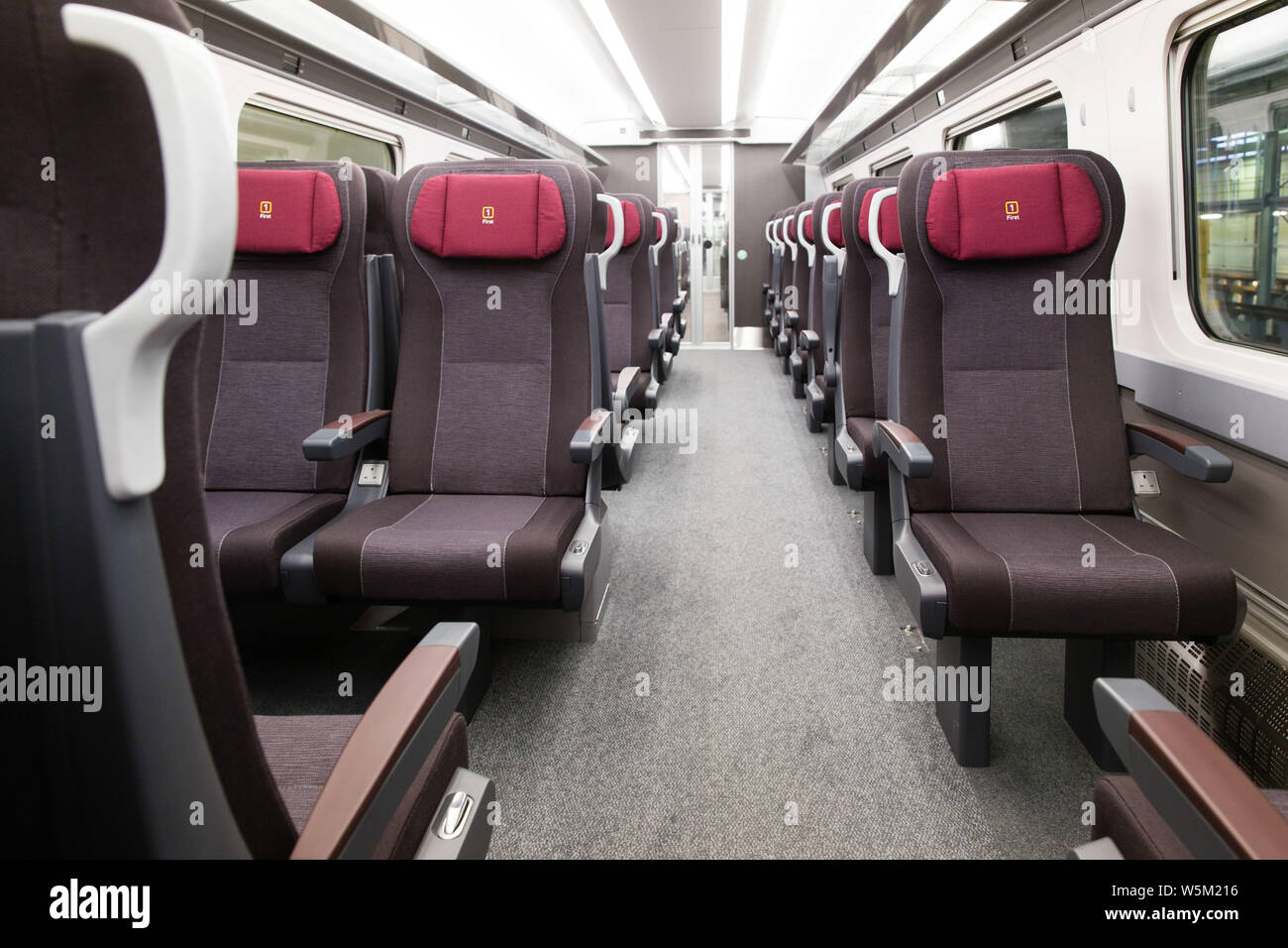 Primo treno di classe sedi del carrello Foto Stock