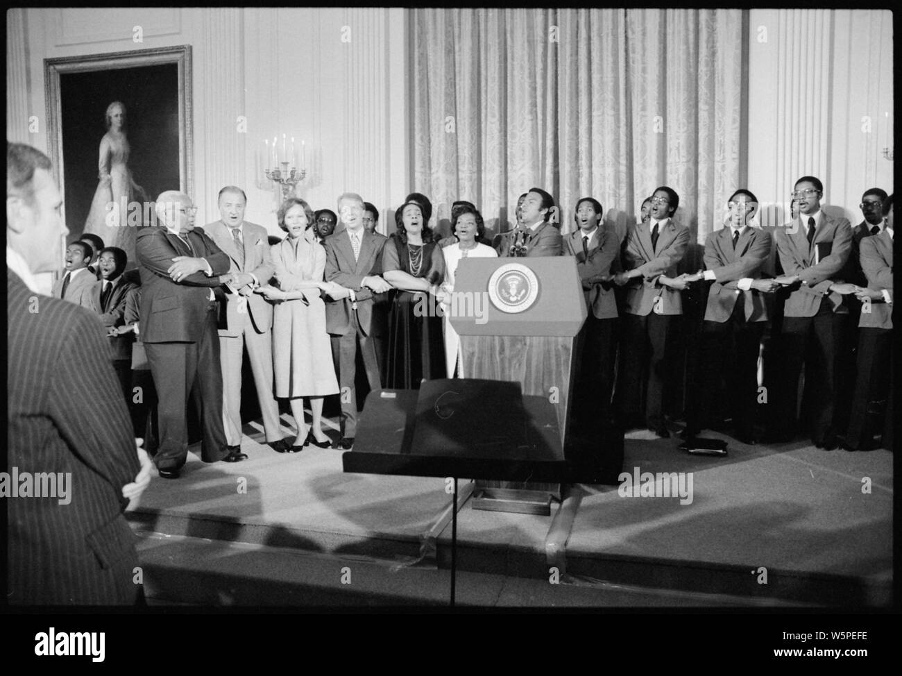 Jimmy Carter con Coretta Scott King, Martin Luther King, Sr. e altri diritti civili leader per una casa bianca ricevimento in onore di Martin Luther King Jr. Foto Stock