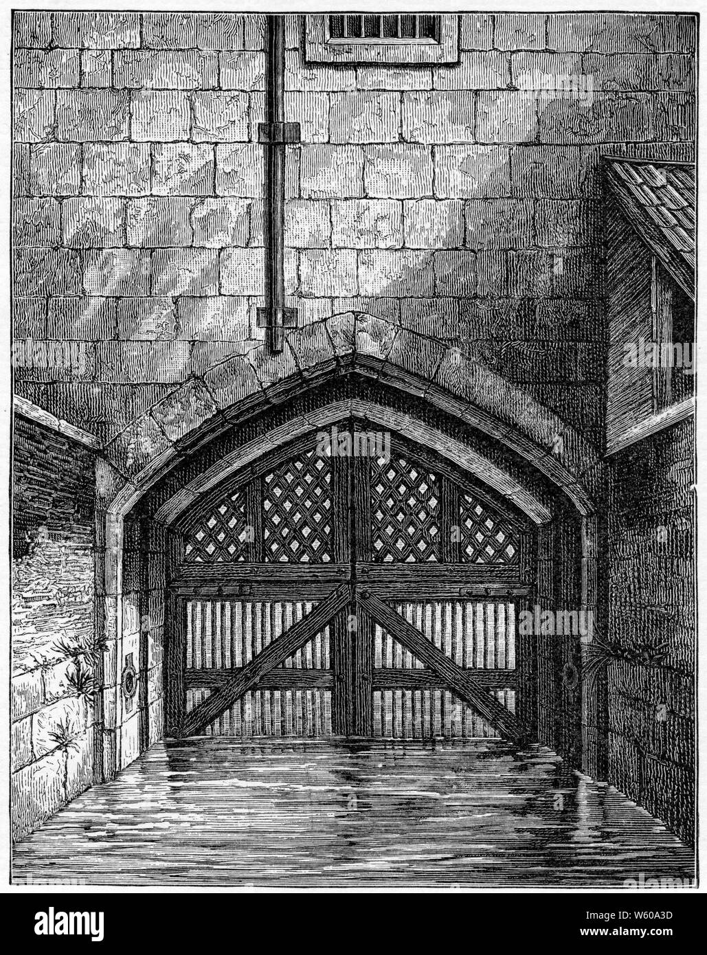 Traditors' Gate, Tower of London, London, c1801. Dopo un disegno di C Tomkins, 1801. La porta dei Traditori è un'entrata attraverso la quale molti prigionieri della Casa di Tudor sono entrati nella Torre di Londra. Il cancello è stato costruito da Edward i, per fornire un'entrata del cancello d'acqua alla Torre ed è parte della Torre di San Tommaso. Foto Stock