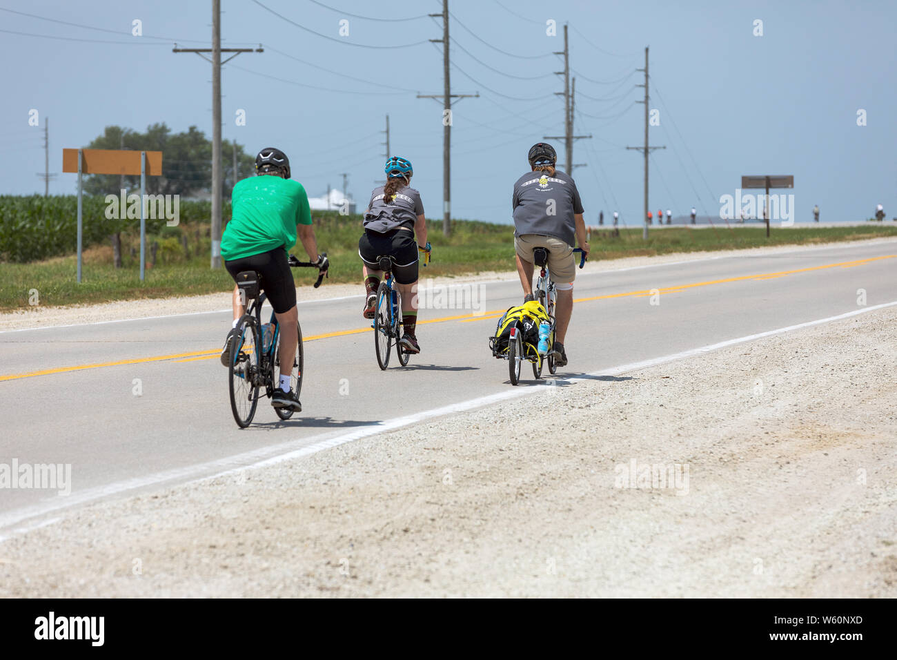 I piloti della giornata finale del 2019 RAGBRAI, Des Moines Register il grande giro in bicicletta attraverso Iowa, in Lee County, Iowa, USA Foto Stock