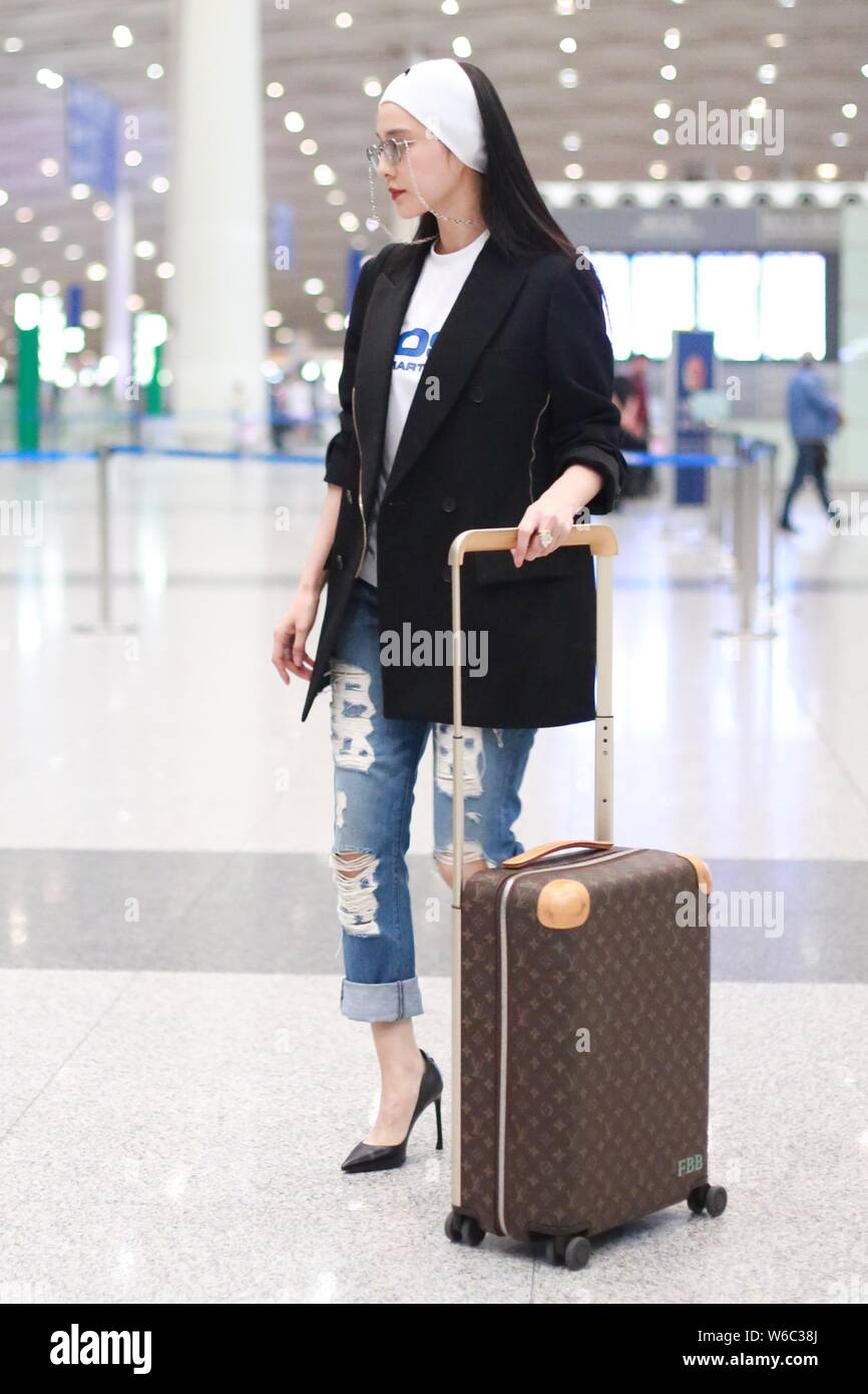 Attrice cinese Fan Bingbing arriva presso l'Aeroporto Internazionale Capital di Pechino per la settantunesima Cannes Film Festival a Pechino, in Cina, il 8 maggio 2018. Foto Stock