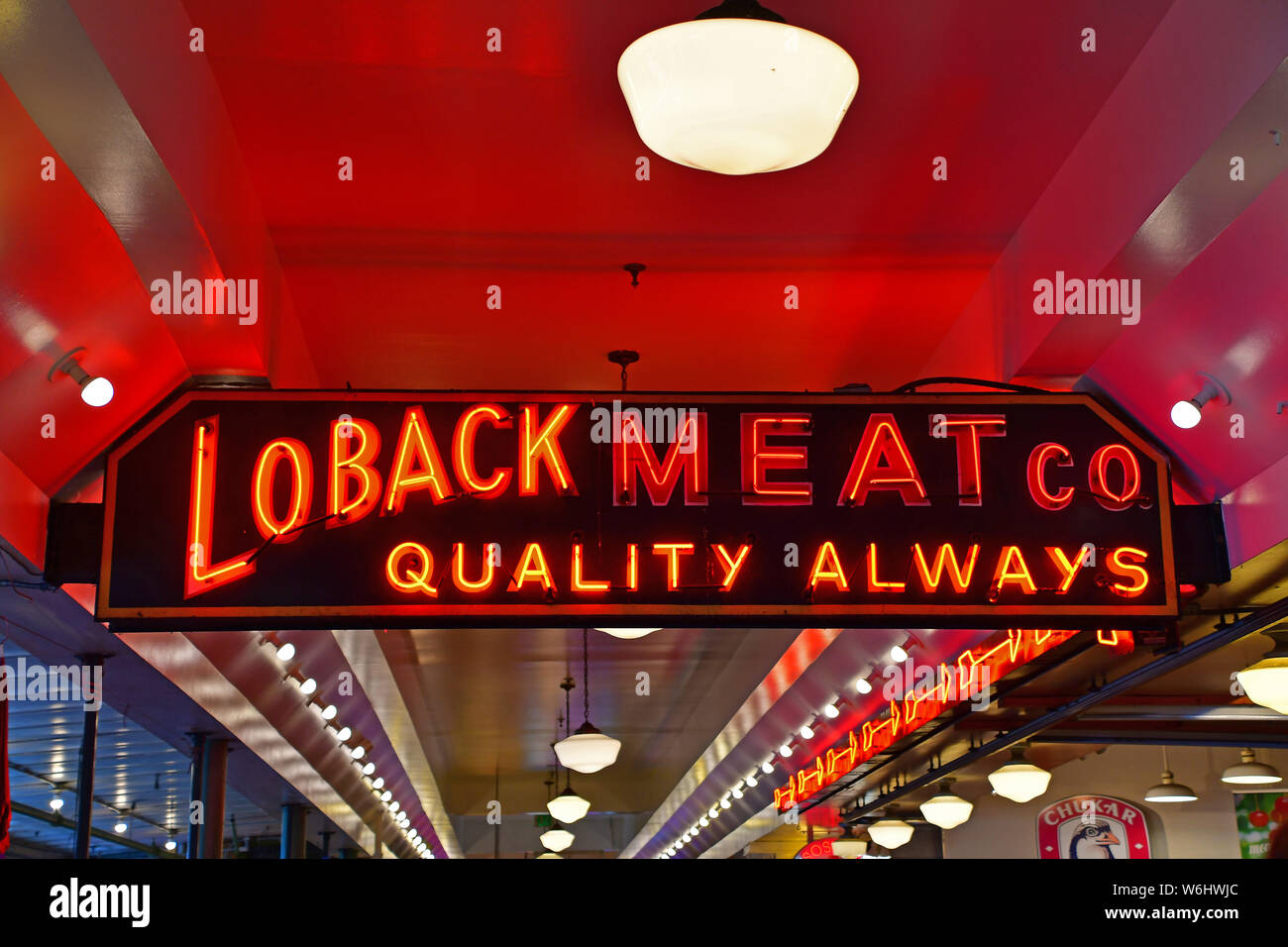 Cartelli al neon presso lo storico Pike Place Market di Seattle Foto Stock