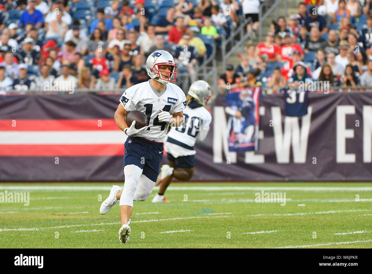 Foxborough, Massachusetts, STATI UNITI D'AMERICA. 29 Luglio, 2019. New England Patriots wide receiver Braxton Berrios (14) presso il New England Patriots training camp tenuto a Gillette Stadium, in Foxborough, Massachusetts. Eric Canha/CSM/Alamy Live News Foto Stock