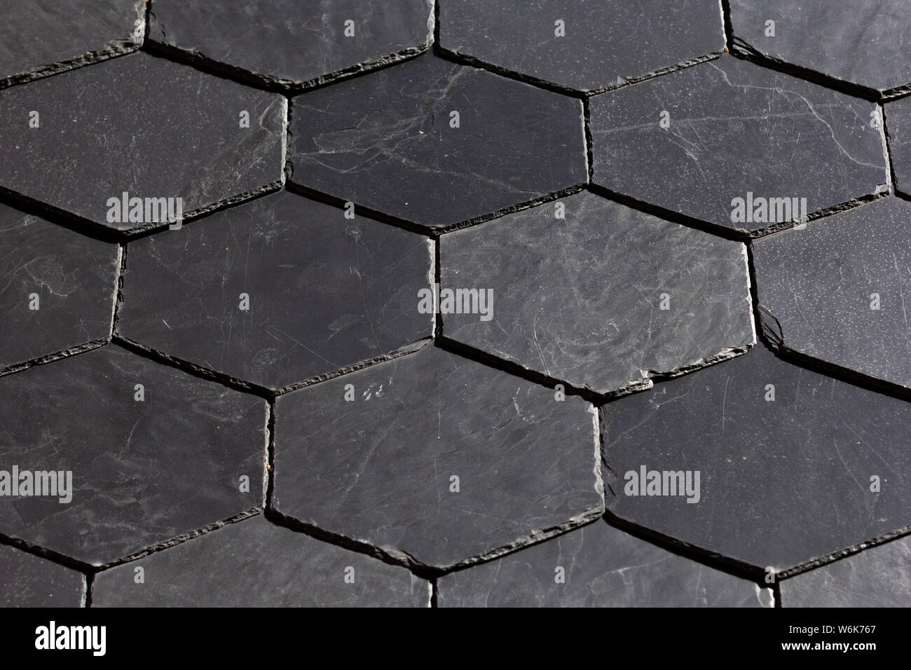 Pietra pavimento a mosaico Nero a parete Foto Stock