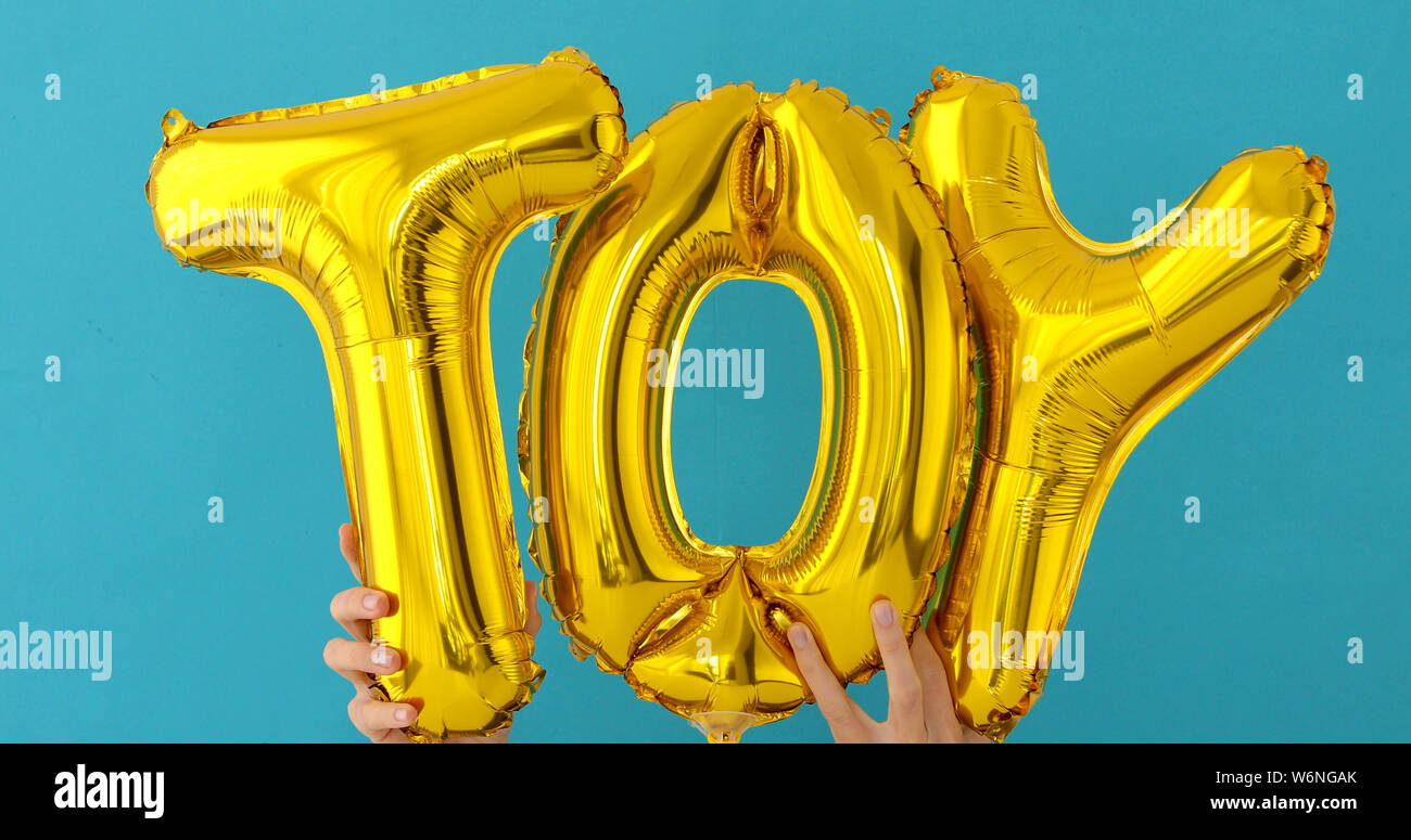 Golden TOY parole fatte di palloncini gonfiabili Foto Stock
