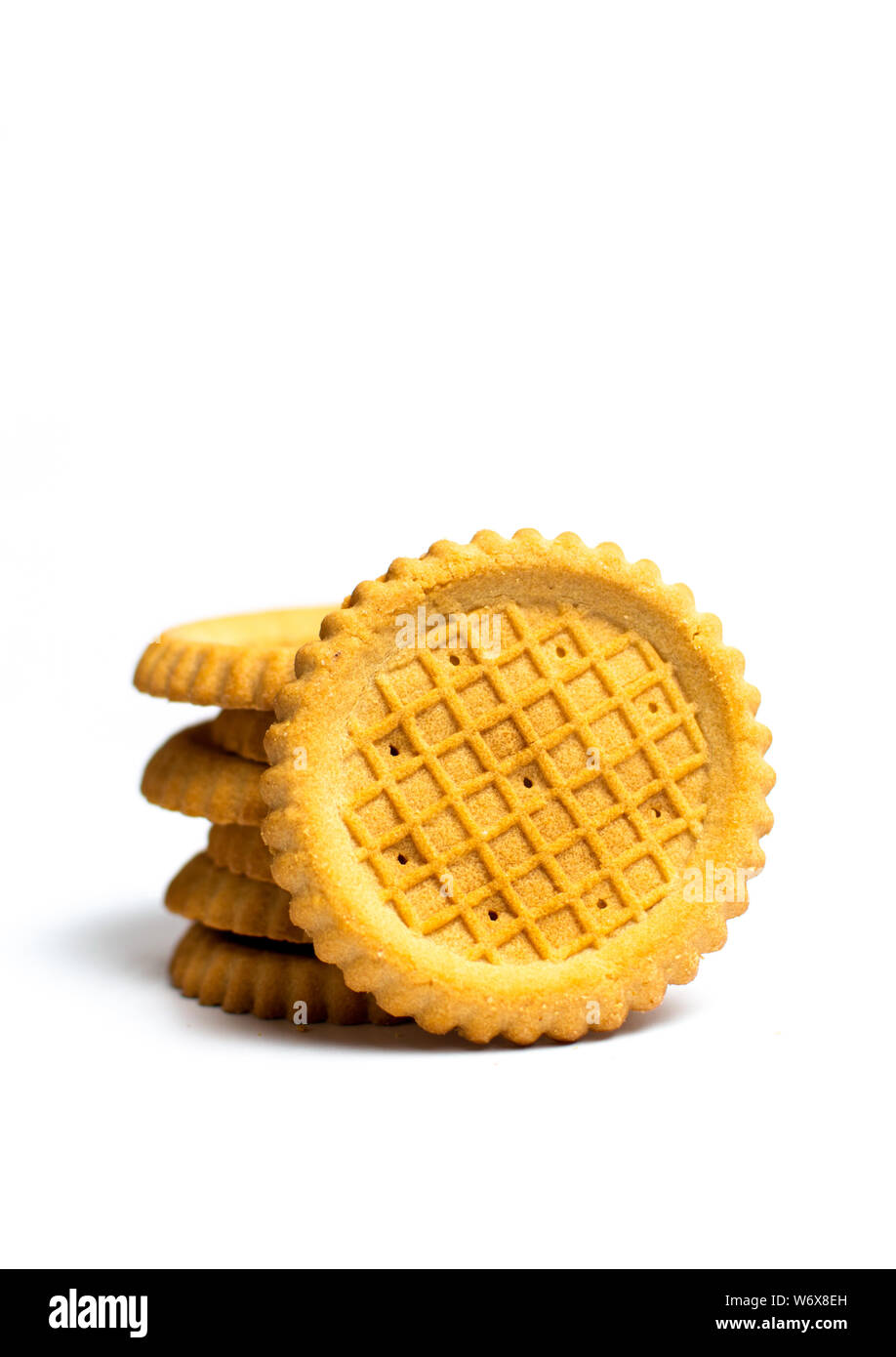 Golden biscotti palo isolata su sfondo bianco Foto Stock