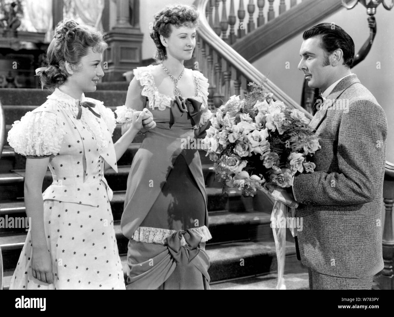 GEORGE BRENT, Olivia de Havilland, Margaret Lindsay, GOLD È IL LUOGO IN CUI SI TROVA, 1938 Foto Stock