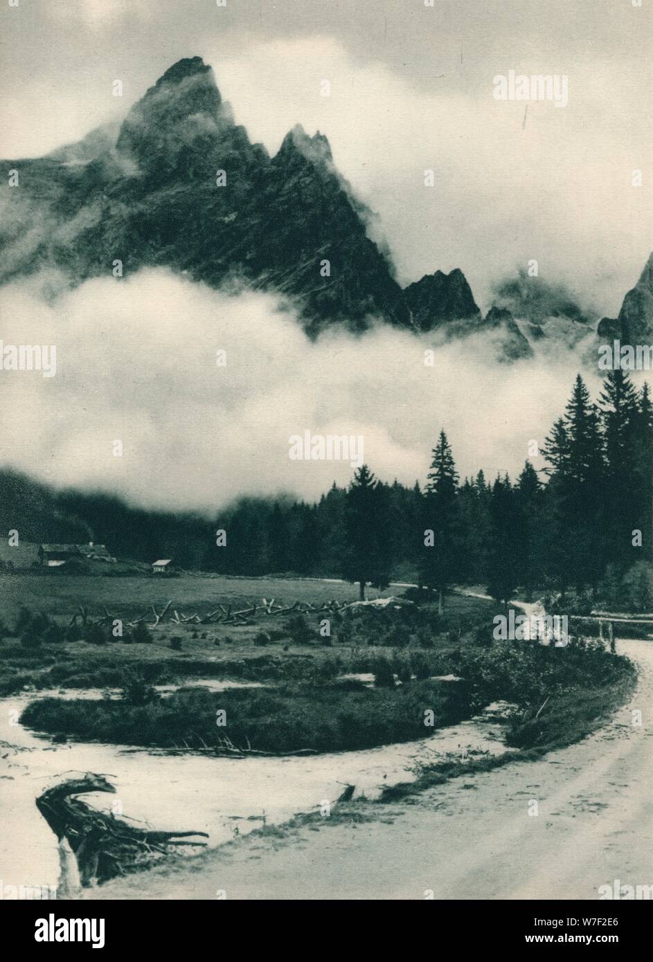 Gruppo della pala in nuvole, San Martino di Castrozza, Dolomiti, Italia, 1927. Artista: Eugen Poppel. Foto Stock