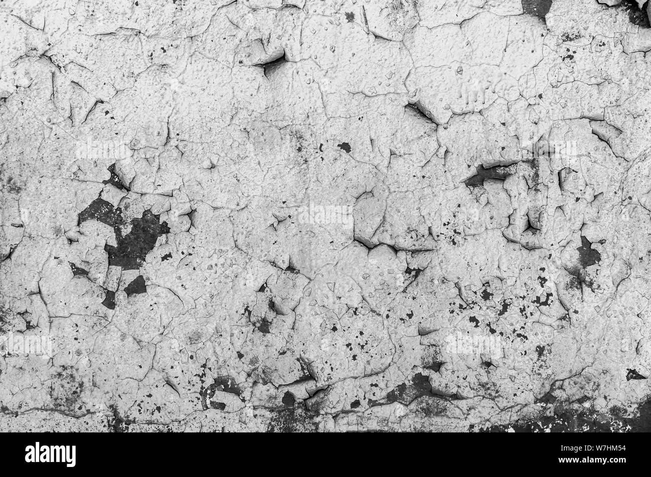 Vecchia vernice incrinata sul muro di cemento. Sbucciare la vernice sulla parete seamless texture. Modello di blu rustico grunge materiale. Parete incrinato con vecchi strati o Foto Stock