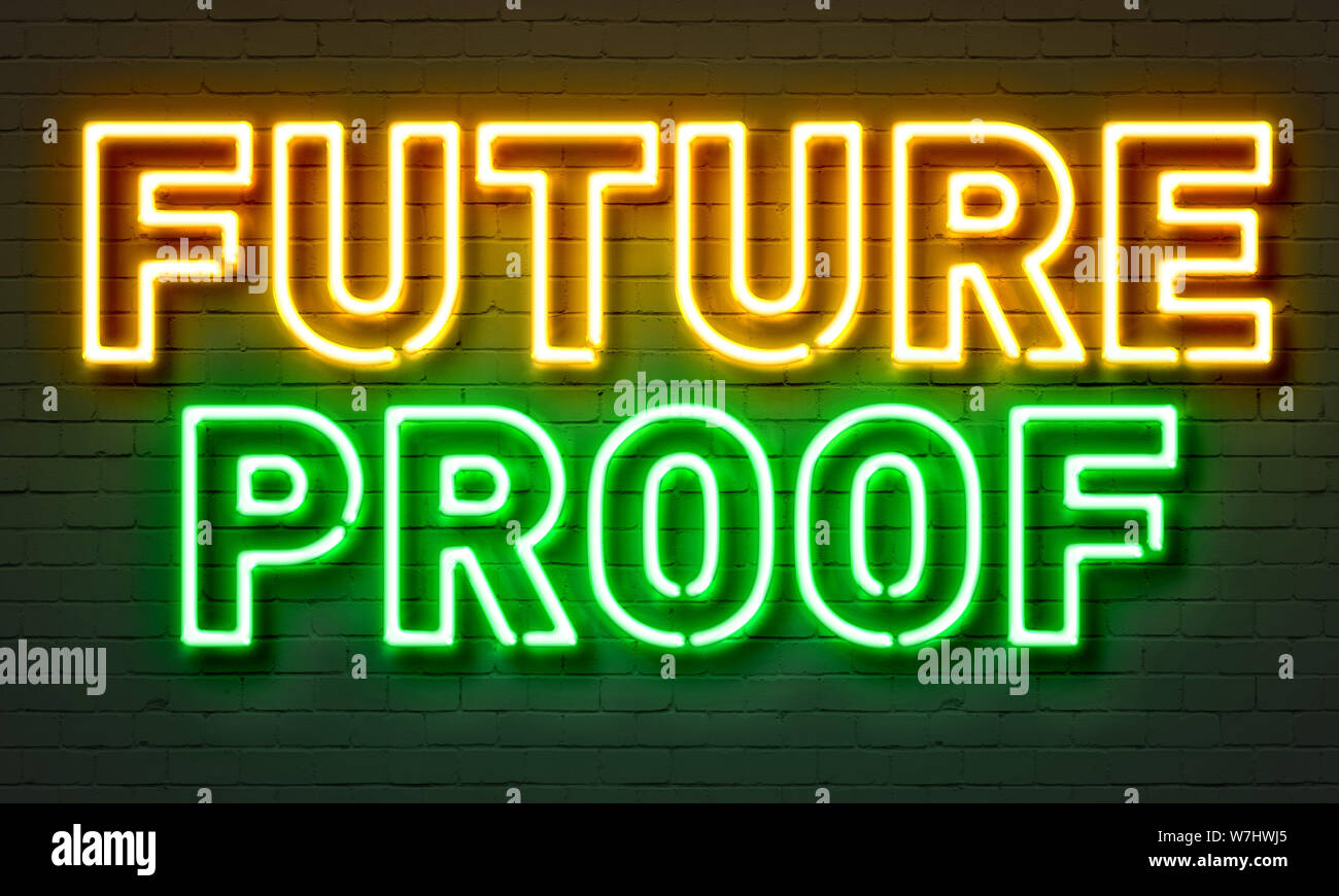 A prova di futuro segno al neon sul muro di mattoni in background Foto Stock