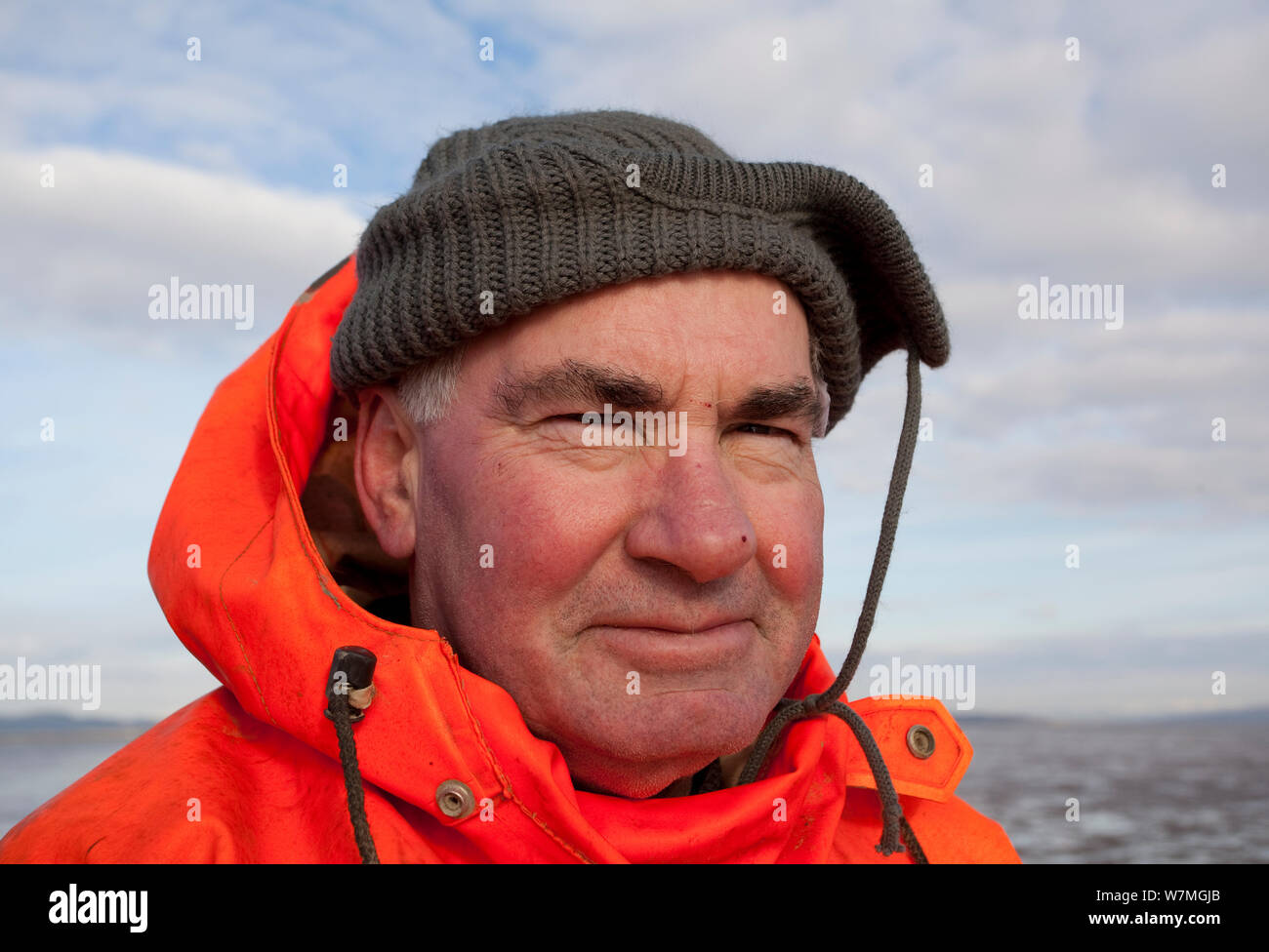 Ritratto di una arricciatura pescatori, Morecambe Bay, Cumbria, Regno Unito, febbraio 2012. Modello rilasciato. 2020visione mostra. Foto Stock