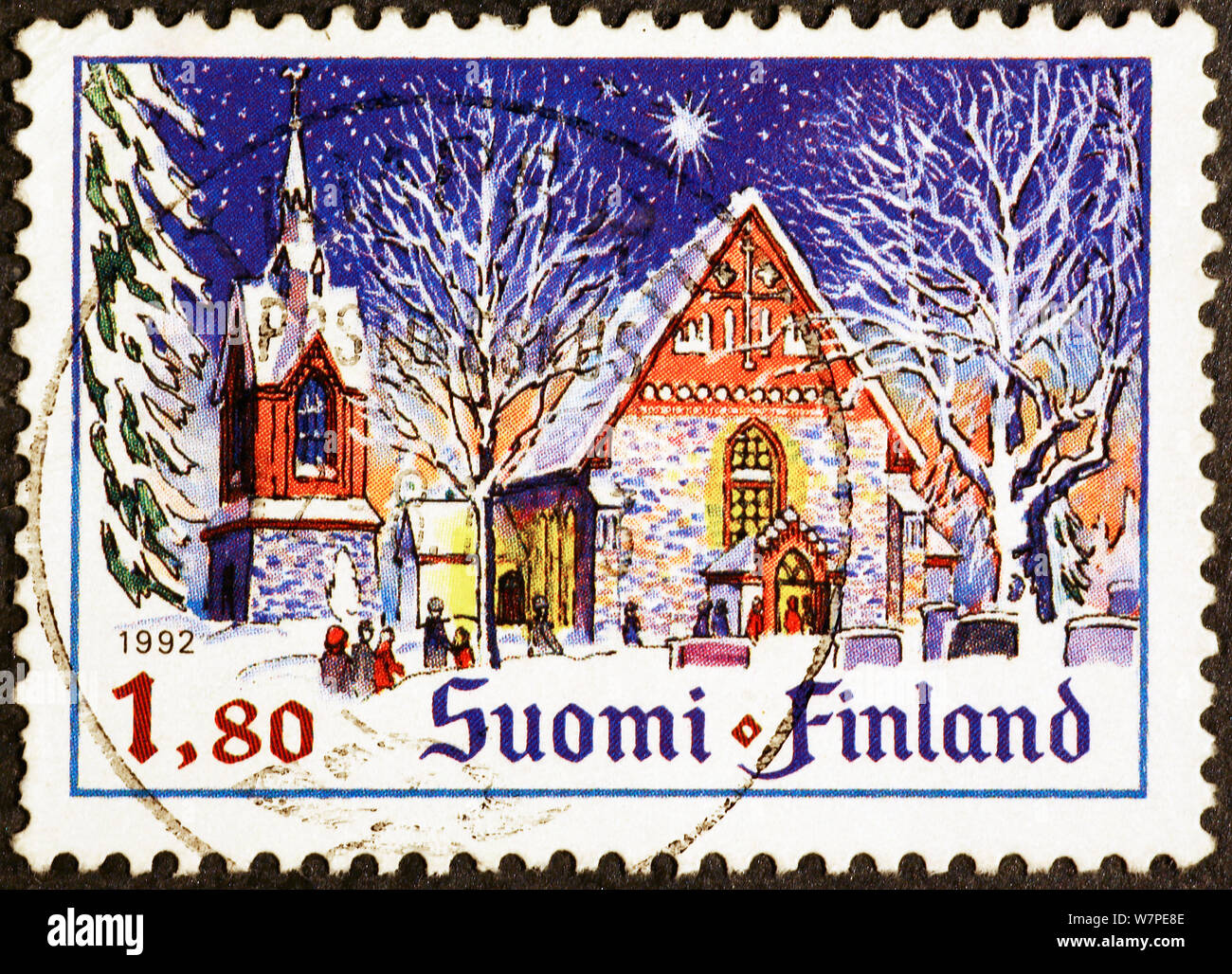Chiesa nella notte di Natale finlandese che su francobollo Foto Stock