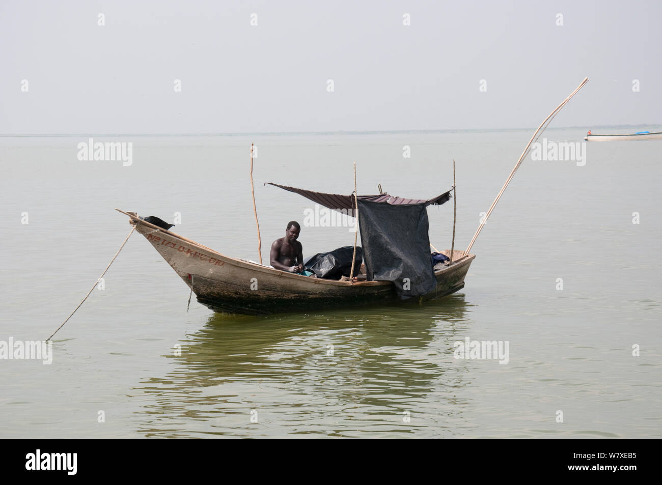 I pescatori di barche sul lago Albert al confine della Repubblica Democratica del Congo e Uganda, Repubblica Democratica del Congo, Africa, Gennaio 2012. Foto Stock